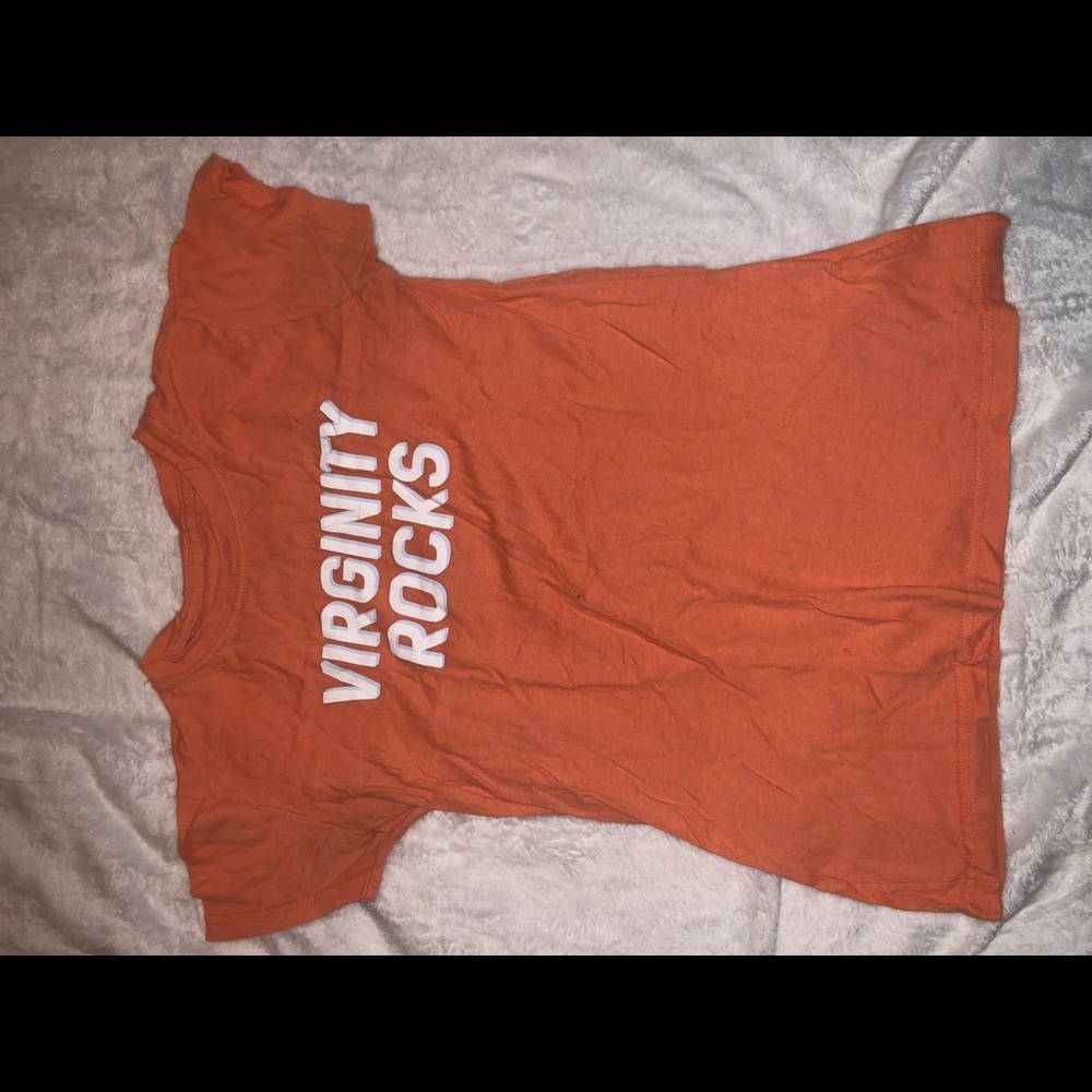 Danny Duncan peach t-shirt, light blue and whit writing